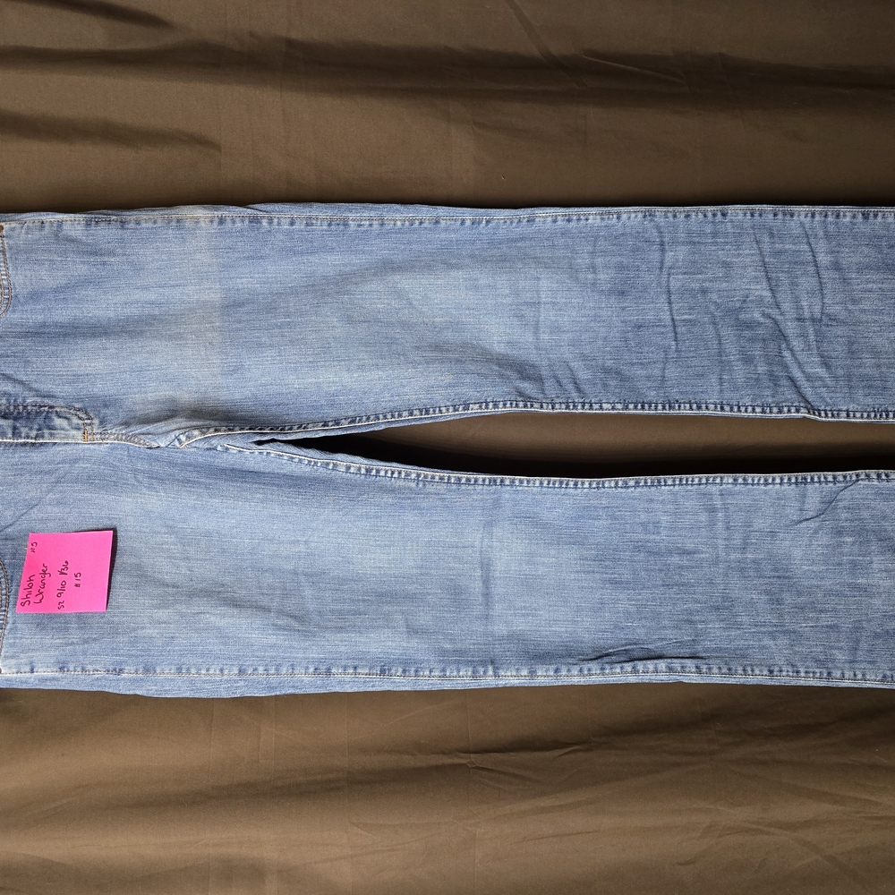 Blue Boot Cut Jeans with Distressed Knee